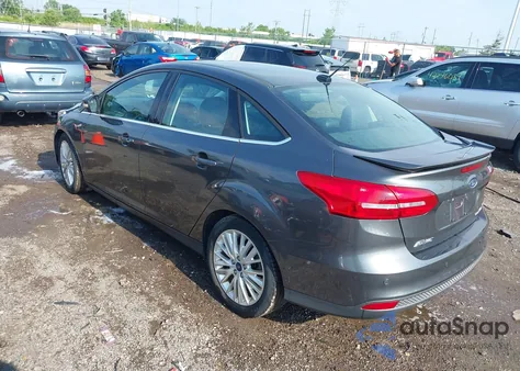 2017 Ford Focus Titanium from USA, damaged, VIN 1FADP3J21HL203736